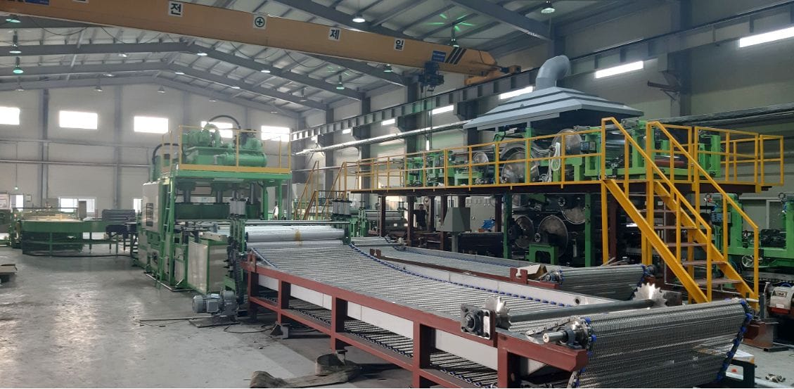 Laminating process joining the wear layer and base layer into one