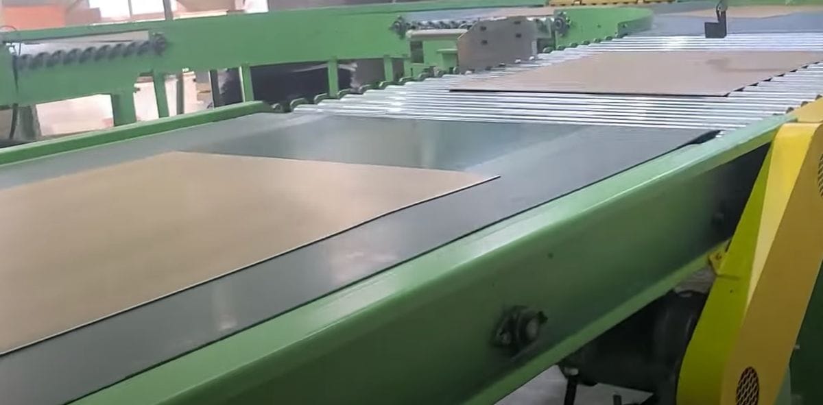 Process of cutting the laminated sheet into standard slabs